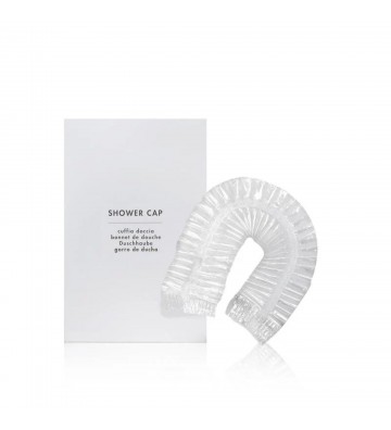 Touca de banho transparente da linha Futura em embalagem de papel mate branco.